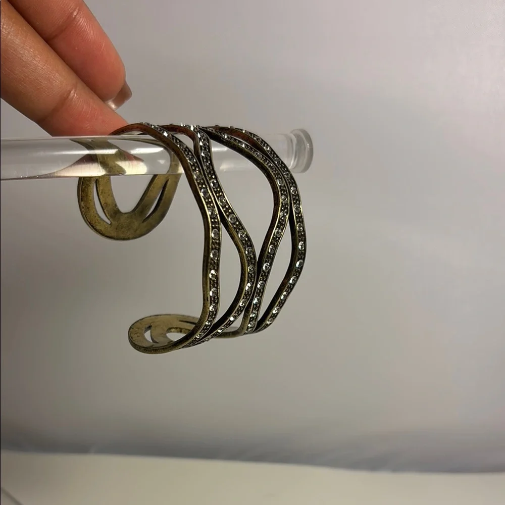 Elegant Gold and Silver Wave Bracelet - Picture 2 of 5